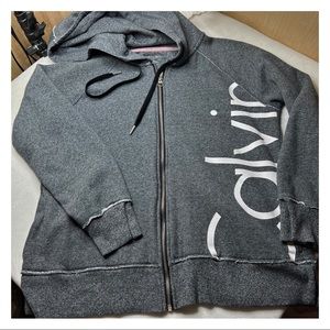 Calvin Klein S-L zip-up hooded sweatshirt for ladies. No rips, tears, or stains.
